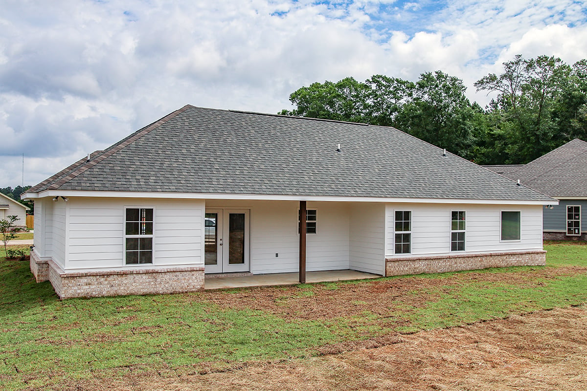 Country, Farmhouse, Traditional Plan with 1459 Sq. Ft., 3 Bedrooms, 2 Bathrooms, 2 Car Garage Rear Elevation