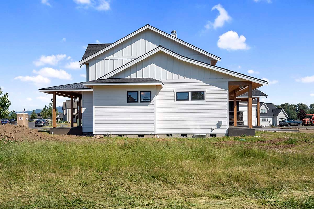 Country, Farmhouse Plan with 3864 Sq. Ft., 5 Bedrooms, 4 Bathrooms, 2 Car Garage Picture 2