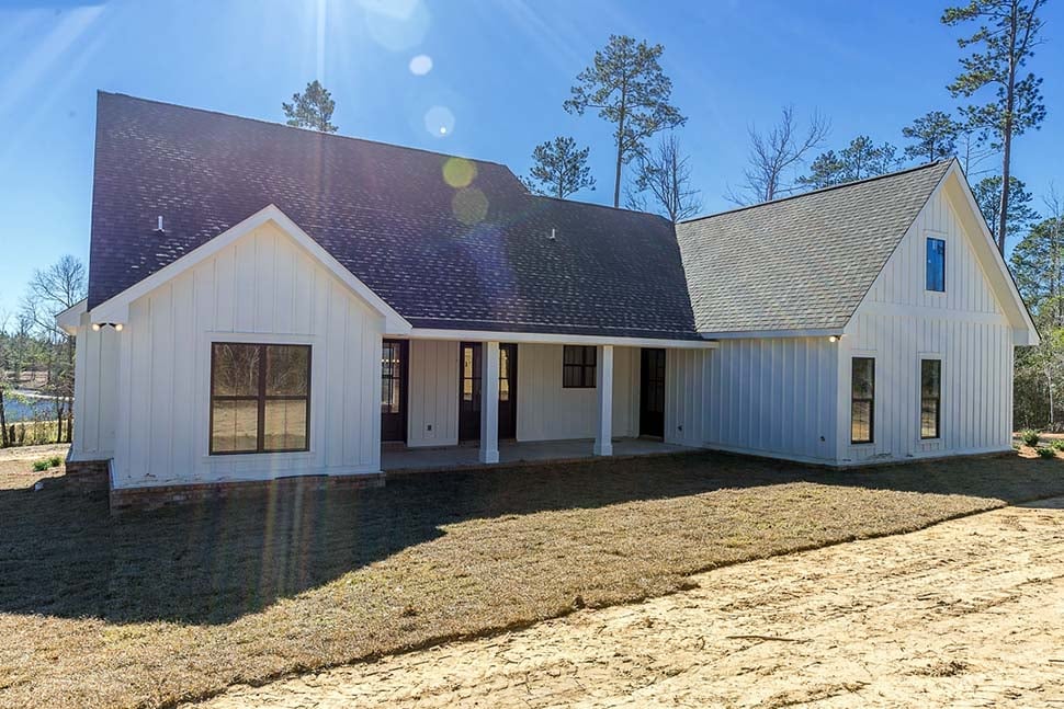 Acadian, Country, Craftsman, Farmhouse Plan with 2077 Sq. Ft., 3 Bedrooms, 2 Bathrooms, 2 Car Garage Rear Elevation