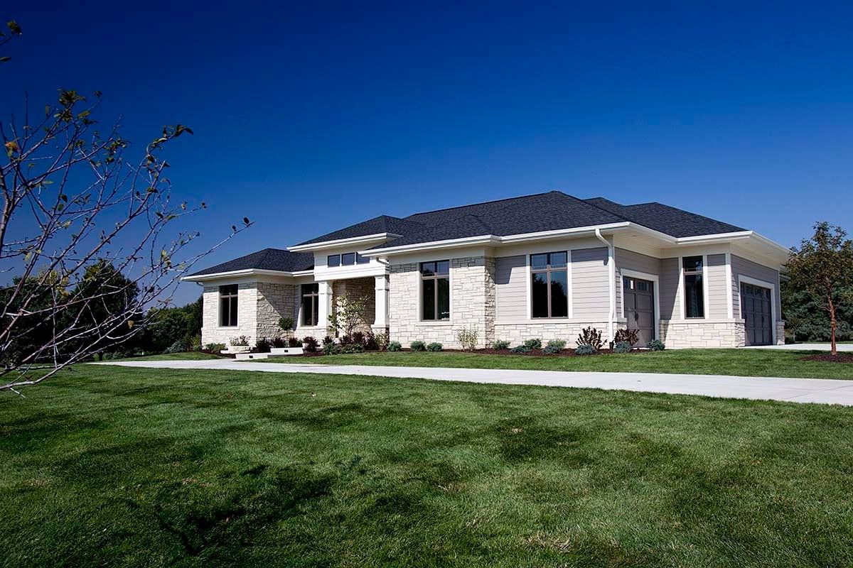Contemporary, Prairie Style Plan with 6114 Sq. Ft., 4 Bedrooms, 6 Bathrooms, 4 Car Garage Picture 2