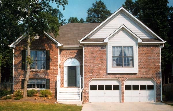 Traditional Plan with 1447 Sq. Ft., 3 Bedrooms, 2 Bathrooms, 2 Car Garage Elevation