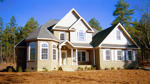 Traditional Plan with 2253 Sq. Ft., 4 Bedrooms, 3 Bathrooms, 2 Car Garage Picture 2