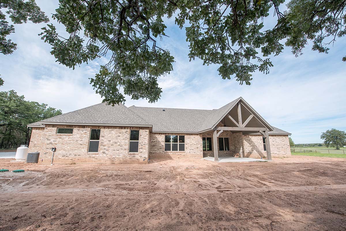 Country, European Plan with 2816 Sq. Ft., 3 Bedrooms, 3 Bathrooms, 3 Car Garage Rear Elevation