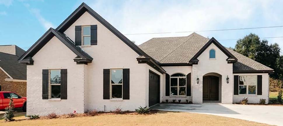 Traditional Plan with 2523 Sq. Ft., 4 Bedrooms, 3 Bathrooms, 2 Car Garage Elevation