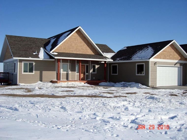 Plan with 3304 Sq. Ft., 3 Bedrooms, 3 Bathrooms, 3 Car Garage Elevation